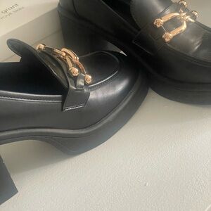Chic Black Loafers with Gold Detailing size 10